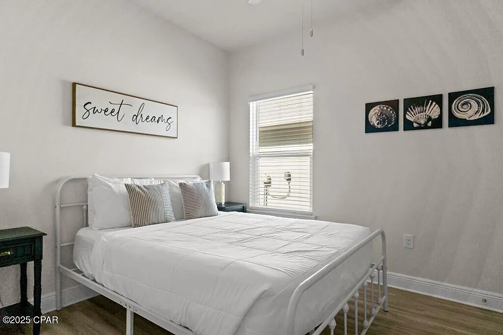 Guest bedroom with seashell artwork